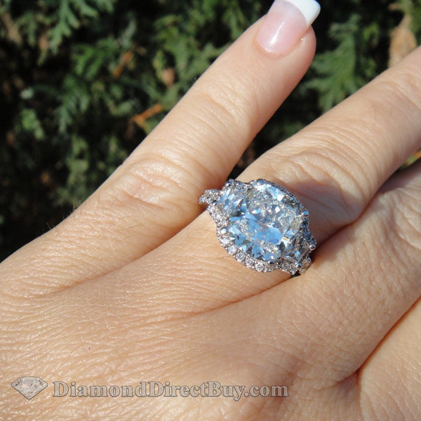 4.59 Carat Halo With Trapezoids Engagement Rings