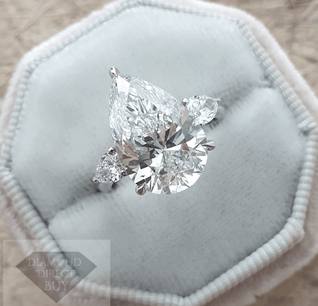 4.86 carat Pear cut 3 stone DIAMOND RING