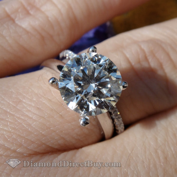 Platinum Solitaire With Wedding Abnd Engagement Rings