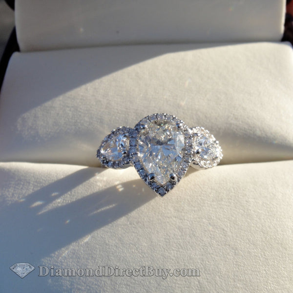 Three Stone Pear Halo Ring Engagement Rings